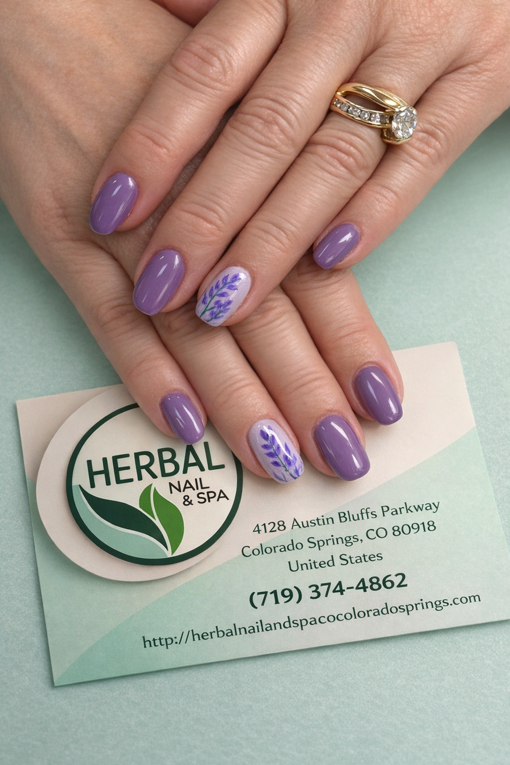 Herbal Nail and Spa logo